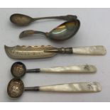 A Georgian silver caddy spoon London 1815, 2 Georgian silver and mother of pearl salt spoons, butter