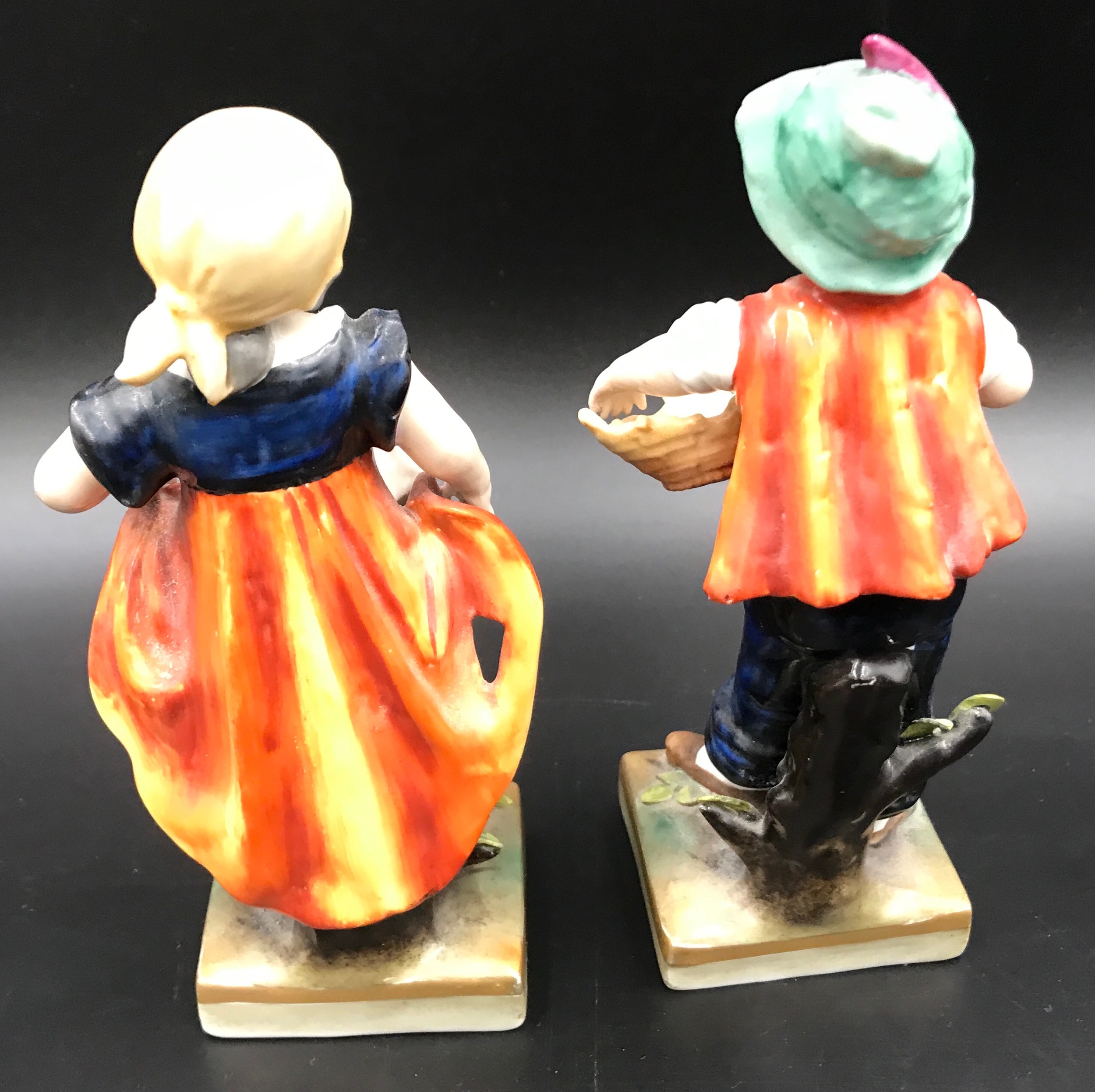 A pair of Sitzendorf figurines, boy 14.5cms h, girl with ducks 14cms h.Condition ReportMinor chips - Image 5 of 6