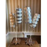 Pair of metal and gilt lamps with metal shades. 105cms h.