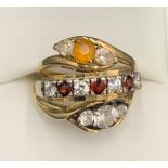 Two 9ct gold dress rings and one 9ct and silver ring. Total weight 5.8gms.Condition ReportGood