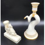 Two Royal Worcester candle sticks, Griffin 12.5cms h x 14 x 5cms at base and twisted cornucopia