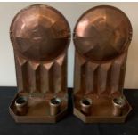 A pair of Arts and Crafts copper wall sconces marked R.W. Ltd. 28cms h.Condition ReportGood