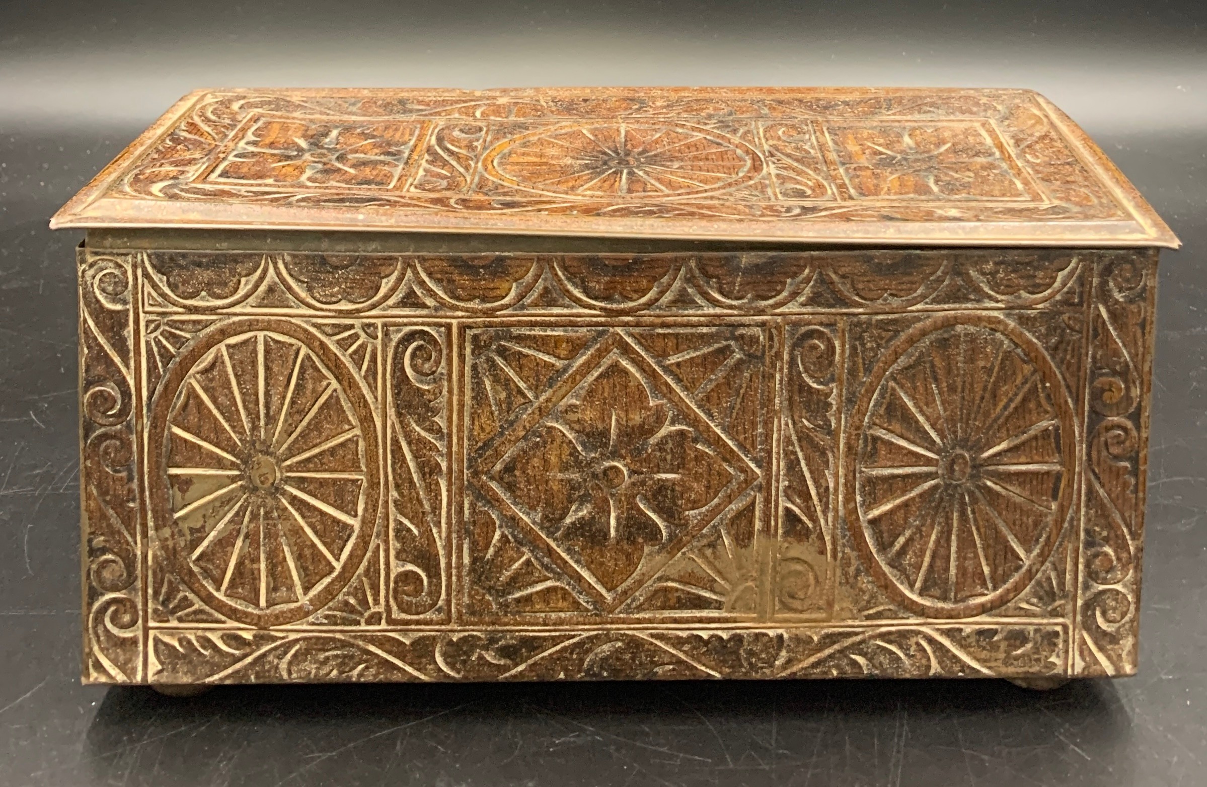 A vintage biscuit tin in the form of a carved oak coffer. 27 x 12 x 12cms h.Condition ReportGood - Image 6 of 6