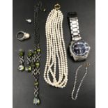 A Gents Pulsar chrome cased wristwatch and a selection of ladies costume jewellery to include