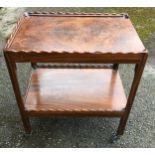 A walnut 2 tier serving trolley. 62cms w x 41cms d x 71cms h.Condition ReportVeneer cracks and