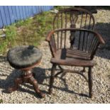 A Victorian walnut revolving piano tripod stool with upholstered seat 52cms h , to seat 36cms h