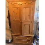 Pine 2 drawer wardrobe over 2 drawers to base. 101 w x 67 d x 193cms h.Condition ReportGood