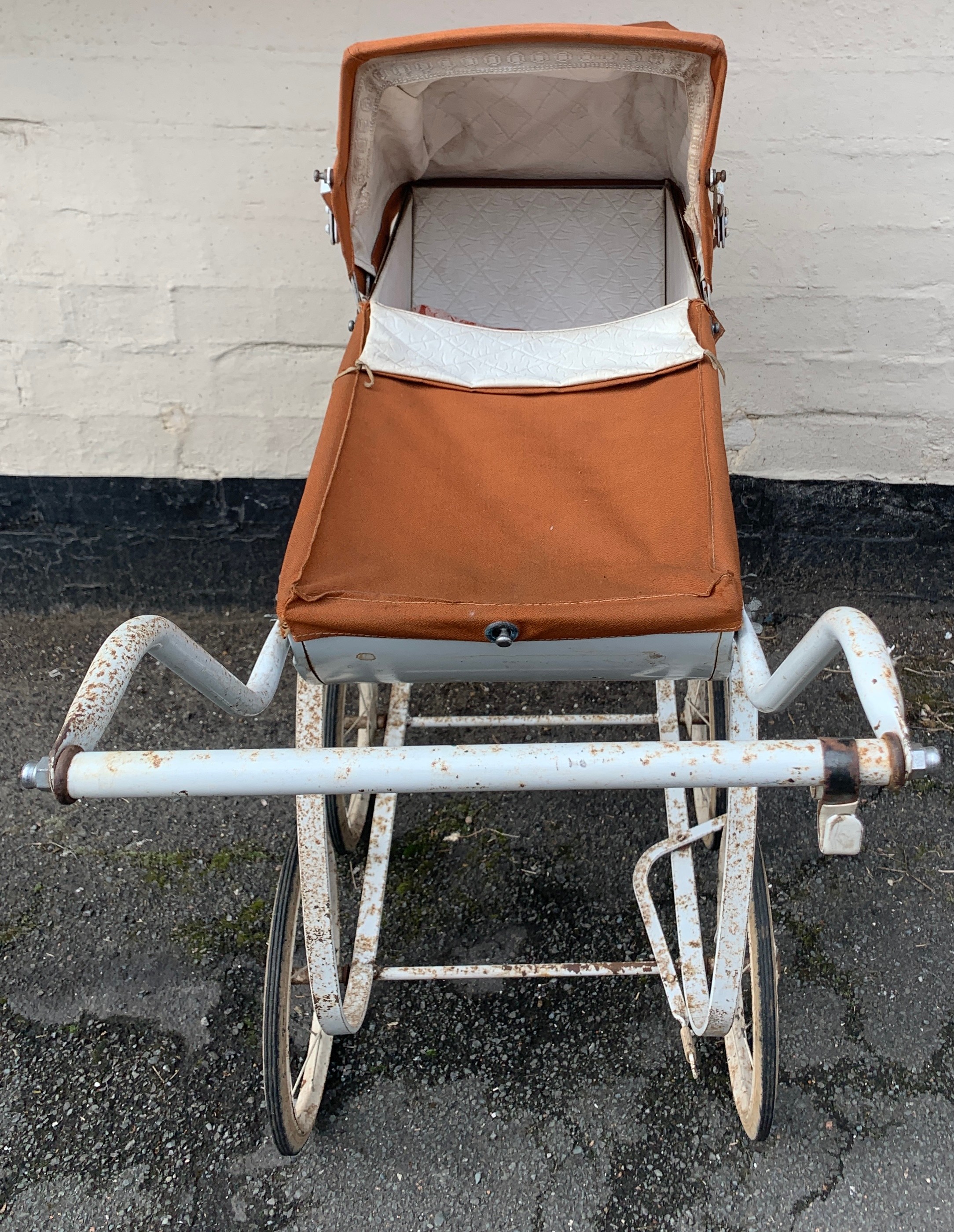 A mid 20thC dolls pram with original cover and hood. 85 l x 85cms h.Condition ReportSome rust to - Image 2 of 3