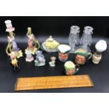 A mixed lot to include a pair of Continental pottery figurine candlesticks 19.5cms h, a small