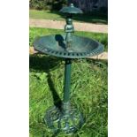 A vintage green cast iron bird bath with figure to top. 47 d x 95cms h.Condition ReportGood
