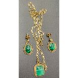 A 9ct gold and malachite pendant with matching earrings. 8.6gms total weight, chain 44cms l.