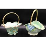 Two Burslem floral painted ceramic baskets with wicker handles. Tallest 27cms h.Condition ReportGood