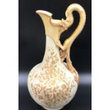 A Royal Worcester dragon handled ewer with gilt floral decoration.Condition ReportGilt rub to base