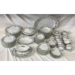 A Noritake dinner service comprising 90 pieces : meat plate 52cms, tureen, dinner plates 25.5cms x