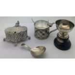 Silver to include two mustard pots, Chester 1901 and 1909, cup and caddy spoon. Sheffield 1917.