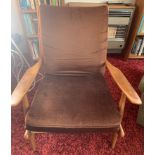 A mid century chair marked Scandart Ltd upholstered armchair. Cond: Wear to surface in places.