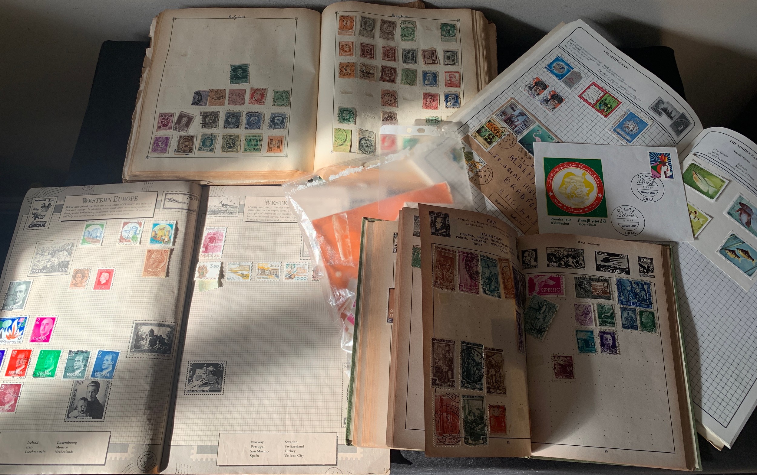 A large quantity of British and World stamps in four albums.