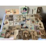 A collection of early 20thC greetings cards and photographs.Condition ReportAll written in and