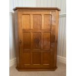 An Alan Grainger of Brandsby "Acornman" English oak corner cupboard. 90cms h x 67cms w.Condition