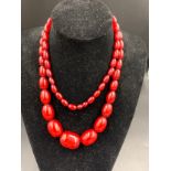 Cherry amber beads, 95gms, 98cms l. Largest bead 30 x 20mm.