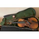 A vintage violin and bow in case.Condition ReportIn need of restoration.