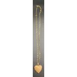 A 9ct gold heart locket on 9ct gold chain. 6gms. Chain 48cms l.Condition ReportGood condition.