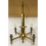 An Art Deco style brass four branch ceiling light fitting. 54cms h x 38cms w.Condition ReportGood