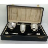 A boxed three piece silver cruet and spoons set by A.L. Davenport Ltd Birmingham 1948. Total