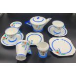 A Shelley part Art Deco period tea service to include a teapot, milk, sugar, 3 cups, 2 saucers, 1