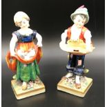 A pair of Sitzendorf figurines, boy 14.5cms h, girl with ducks 14cms h.Condition ReportMinor chips