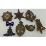 Seven various medals and cap badges to include The Boys Brigade, The France and German Star,