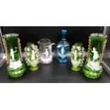 A collection of Mary Gregory style glass ware to include a pair of tall green vases 28cms h, a