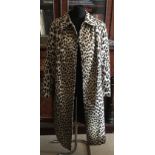 A long leopard print over coat by Lanvin, Paris. Measures from underarm to underarm 54cms and