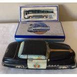 A tinplate "Highway Patrol" car 28cms l with a boxed Corgi East Yorkshire Diplomat Plaxton Coach.