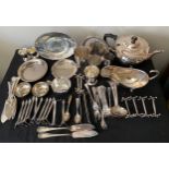A quantity of English and French silver plated table ware to include Christofle knife rests etc.