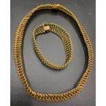 A 9ct gold collar style necklace and matching bracelet. Total weight 51.2gms.Condition ReportGood