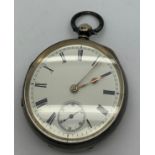 A silver cased pocket watch, Chester 1895. White enamel face with Roman numerals. 127.4gms total