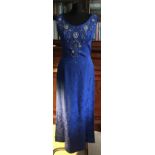 A cobalt blue damask print crepe long dress with beading to front and back neckline size 10Condition
