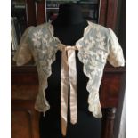 A collection of old lace wear to include a cream/pink lace bolero with silk tie to front small size,