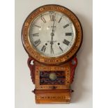 An inlaid American drop dial wall clock. 73cms h x 43cms w. With key. Condition ReportGood