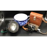A portable signalling lantern Admiral Pattern 5110.D, Arco 8 Cine Camera with leather case, a