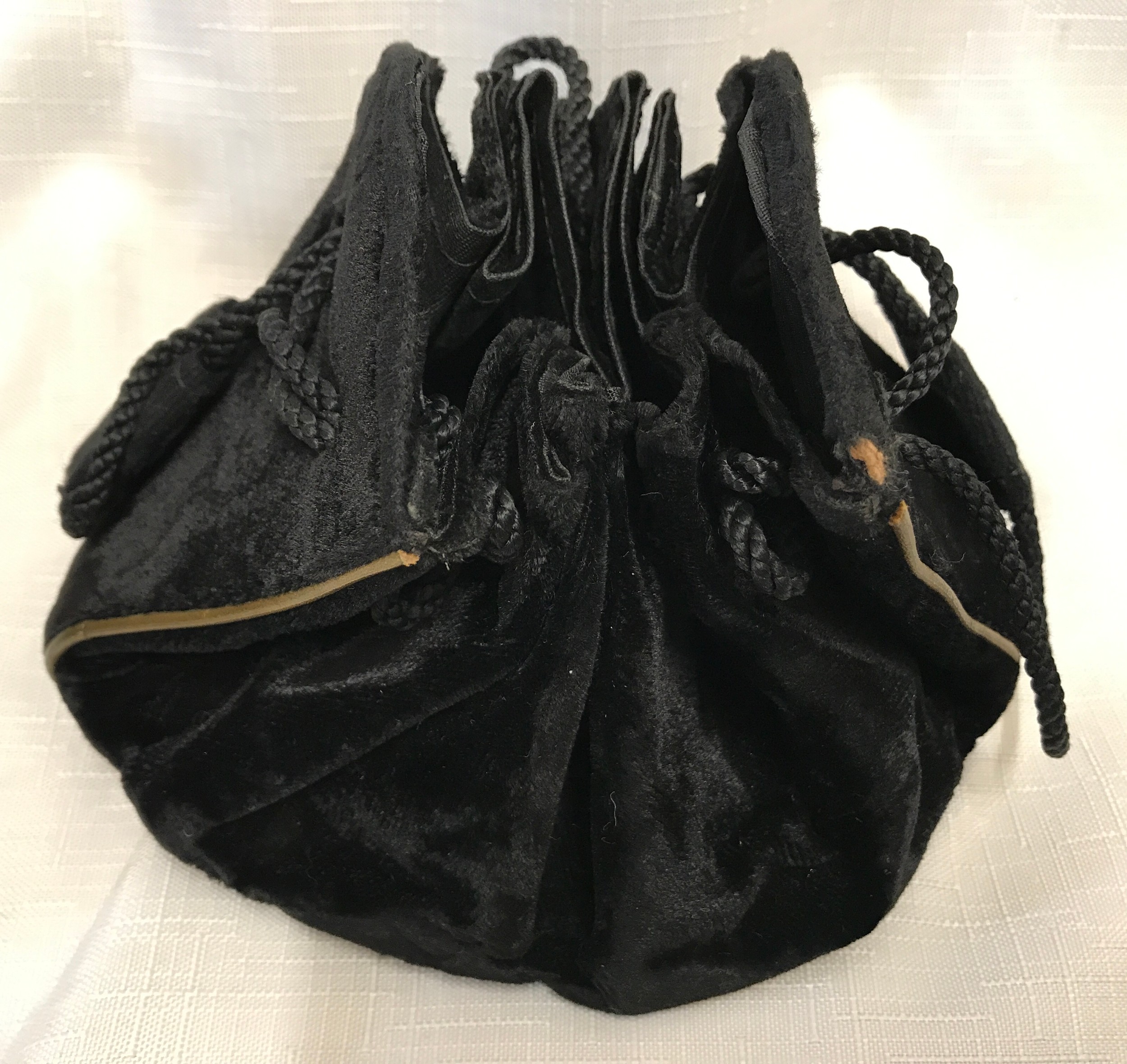 A 1950's black clasp handbag 24cmx 15cm, a small black velvet draw string handbag and a 1950's - Image 5 of 5