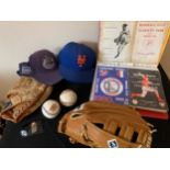 A quantity of baseball related memorabilia to include programmes, bat, balls etc.Condition