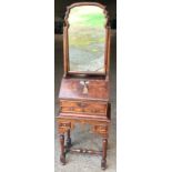 A 19thC walnut vanity dressing table with drop down front and 3 drawers to base. 152cms h x 44cms