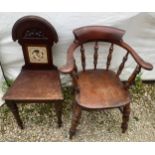A smokers bow armchair together with a 19thc hall chair with tile to the back.Condition