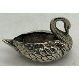 A silver pincushion realistically modelled in the form of a swan with arched neck, Birmingham
