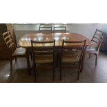 An extending G Plan dining table and 6 chairs. 163 x 100cms closed, 254cms open. Cond: Good