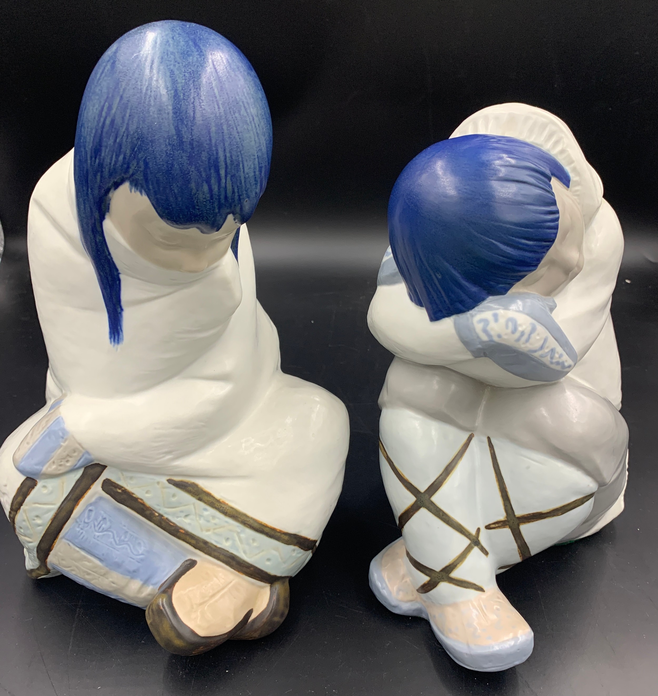 Two large Lladro Eskimo figures. Tallest 30cms h.Condition ReportGood condition apart from a tiny