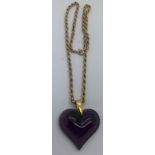 A Lalique glass heart shaped pendant in purple colour on a 9ct gold rope twist chain, chain 43cms l.