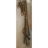 Vintage fireman's brass hoses and nozzles to include large Pyrene foam making branch pipe. 146cms